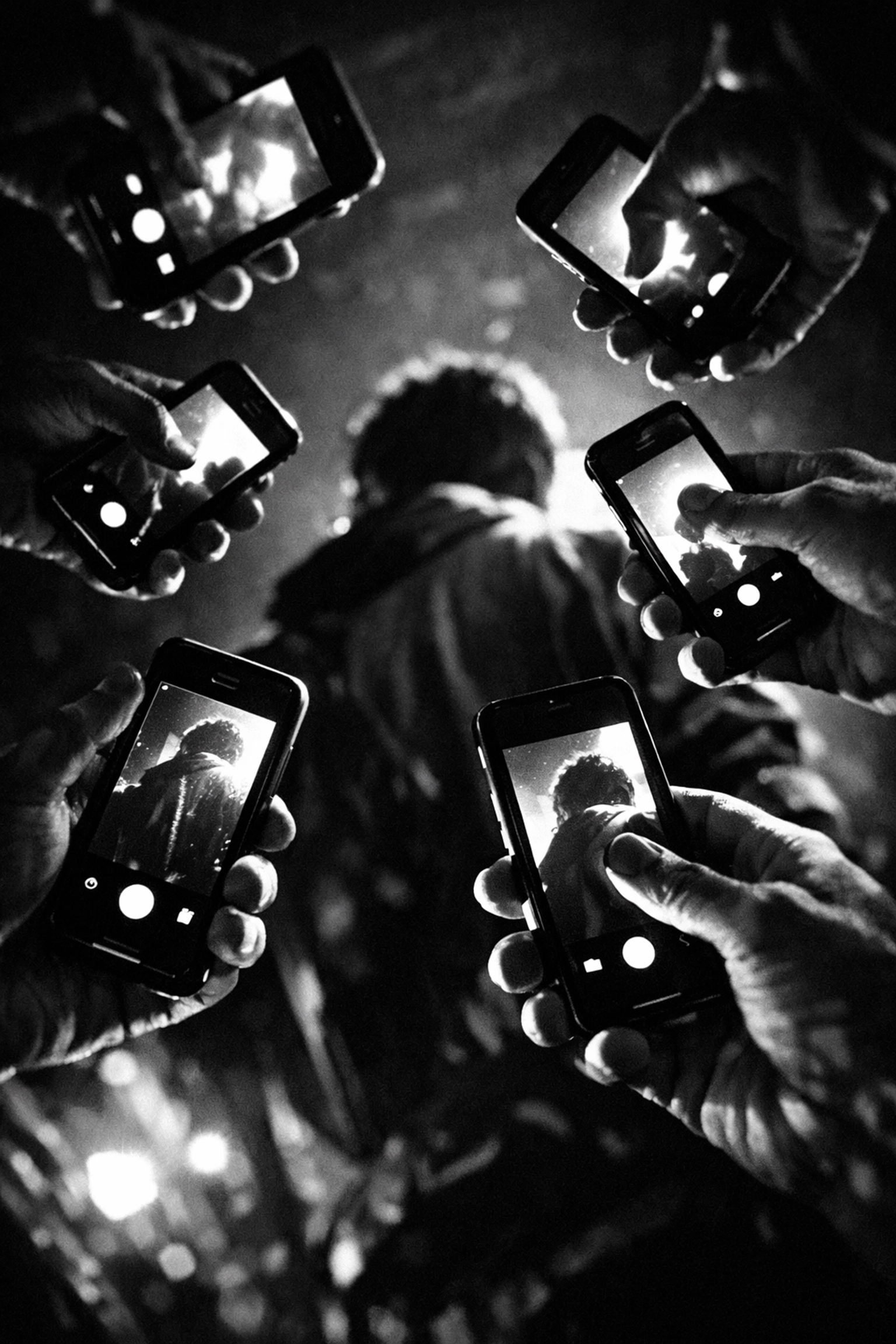 Multiple smartphones capturing content showing democratization of brand storytelling