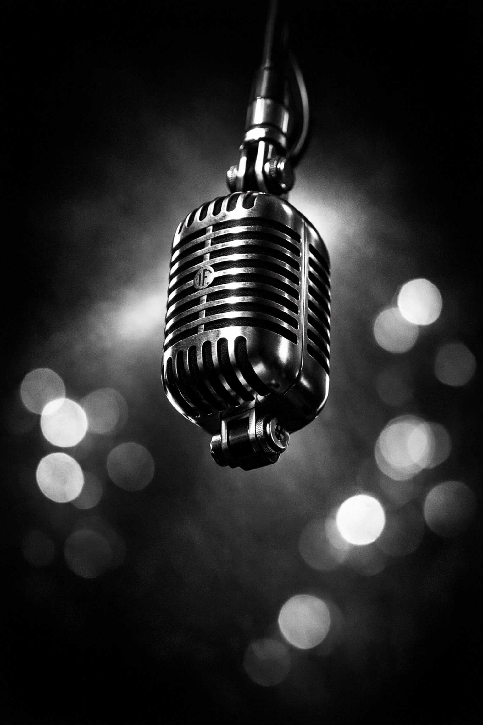 Professional podcast microphone representing voice-driven marketing and relationship building