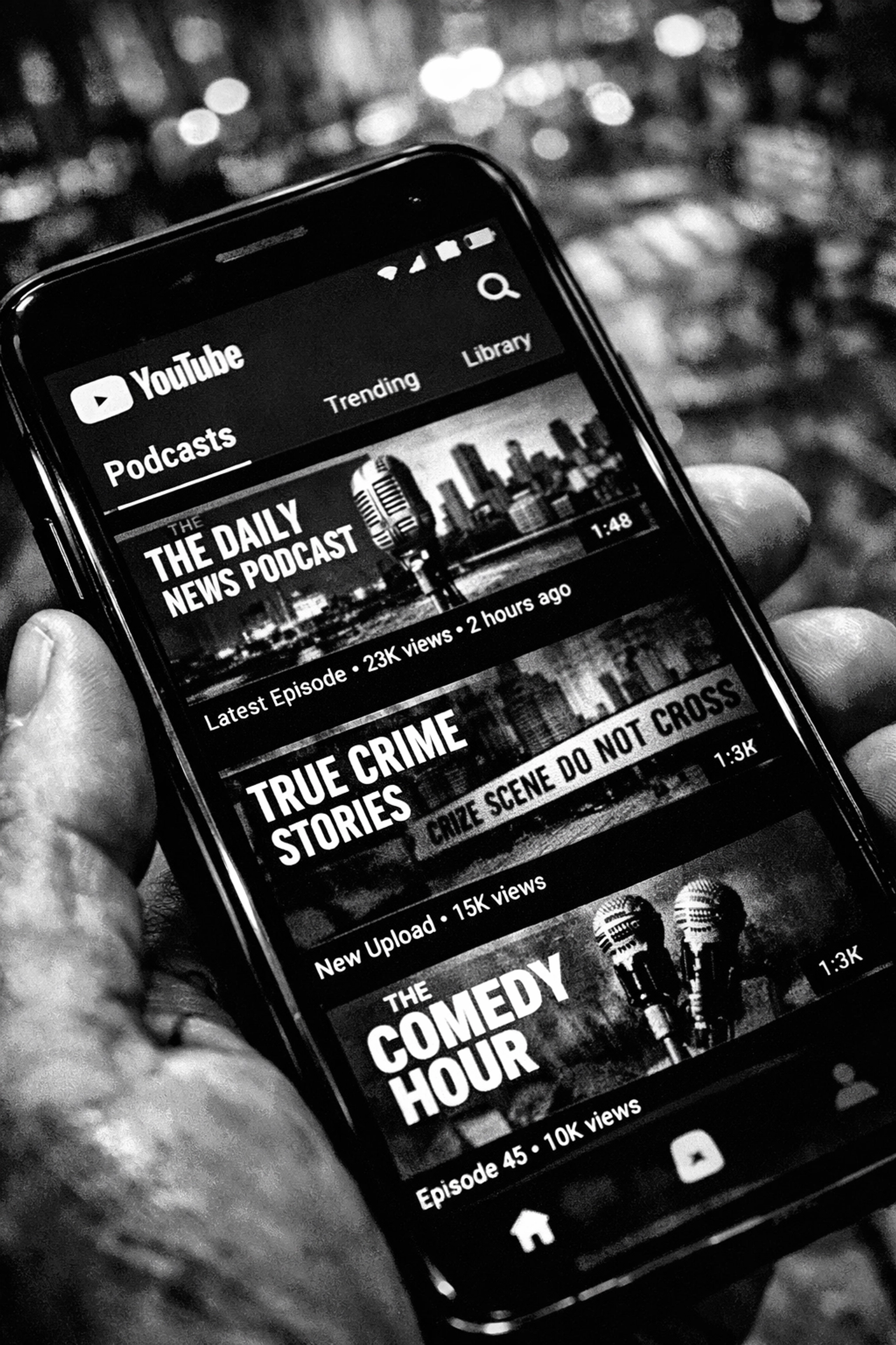 YouTube podcast app on smartphone showing video podcast discovery