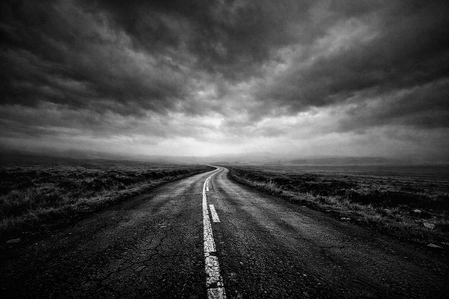 A long road extending to the horizon symbolizing the long-term journey of an organic SEO marathon.