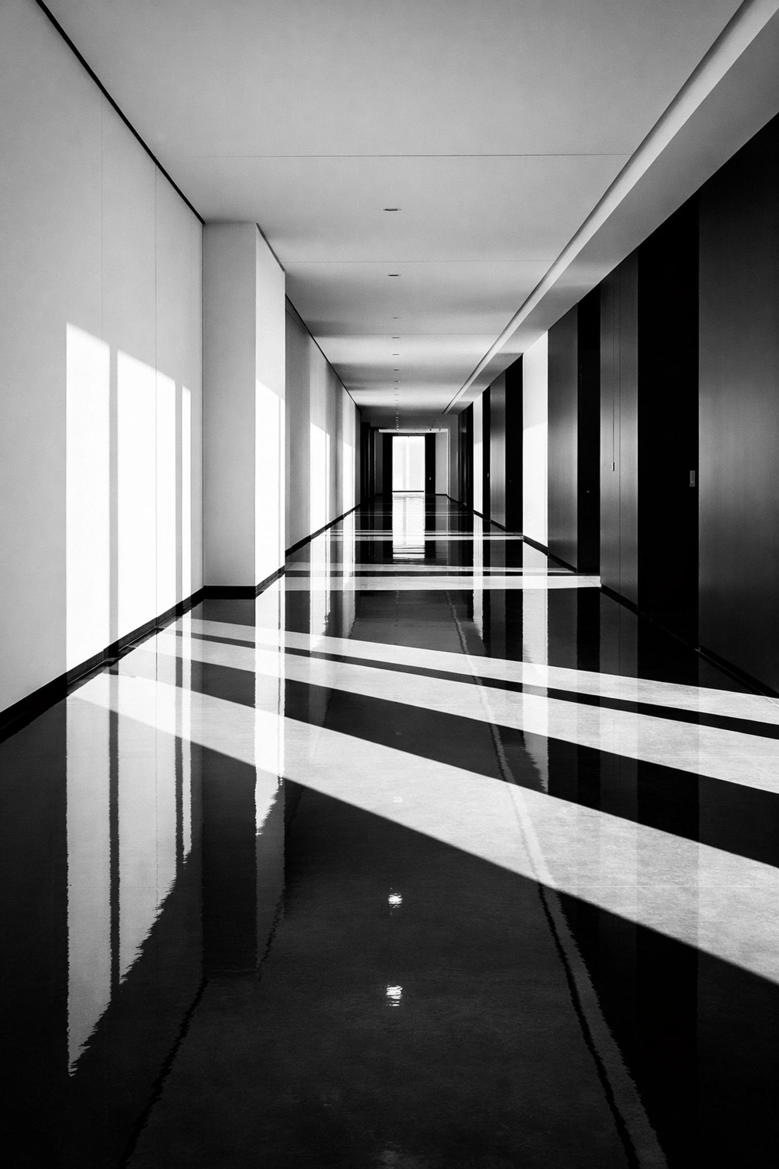 A minimalist office hallway representing a frictionless user journey and strategic marketing design.