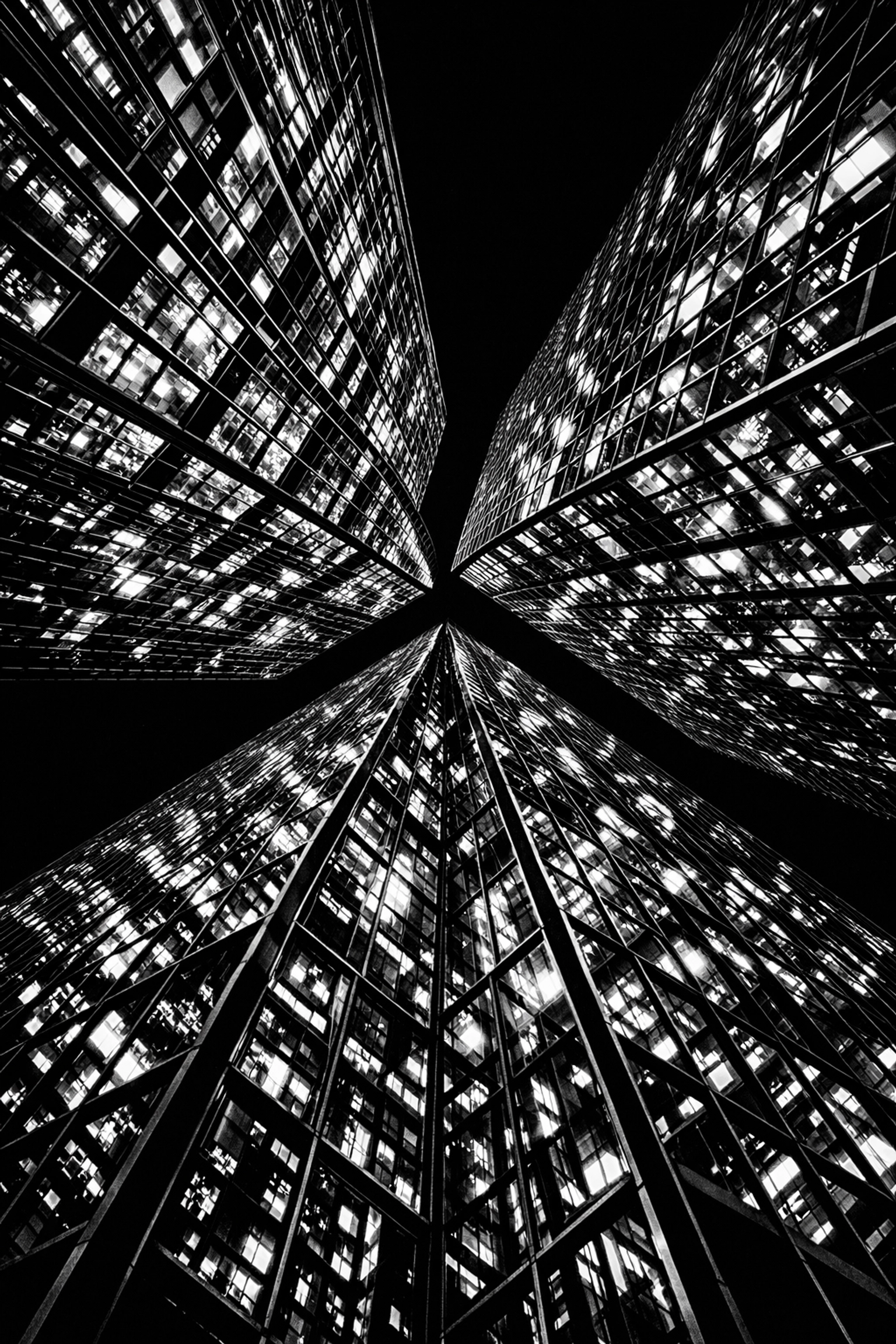 Modern skyscrapers reaching upward, symbolizing business growth and a connected digital marketing landscape.