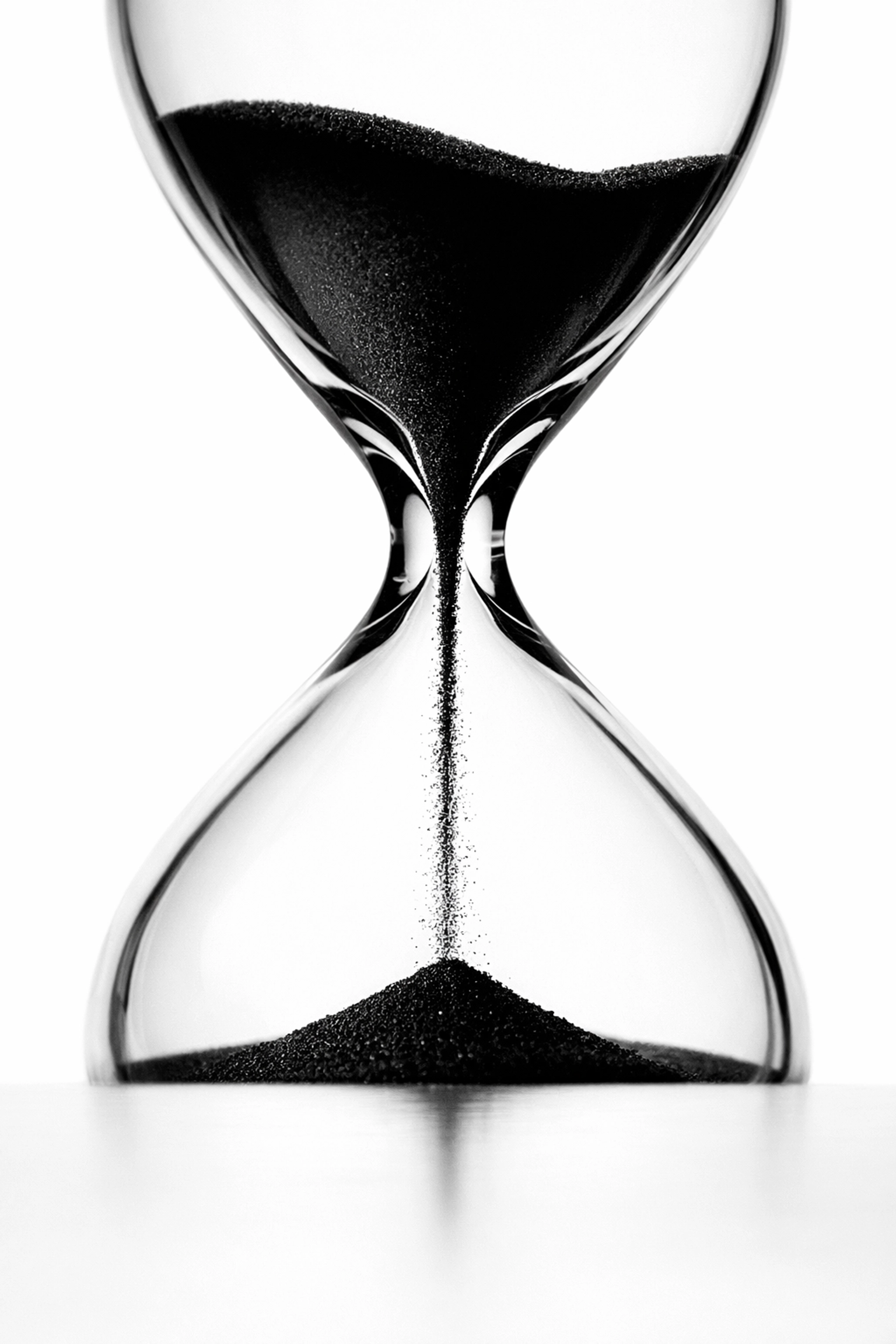 Hourglass showing flowing sand to represent long-term brand building and content marketing value.