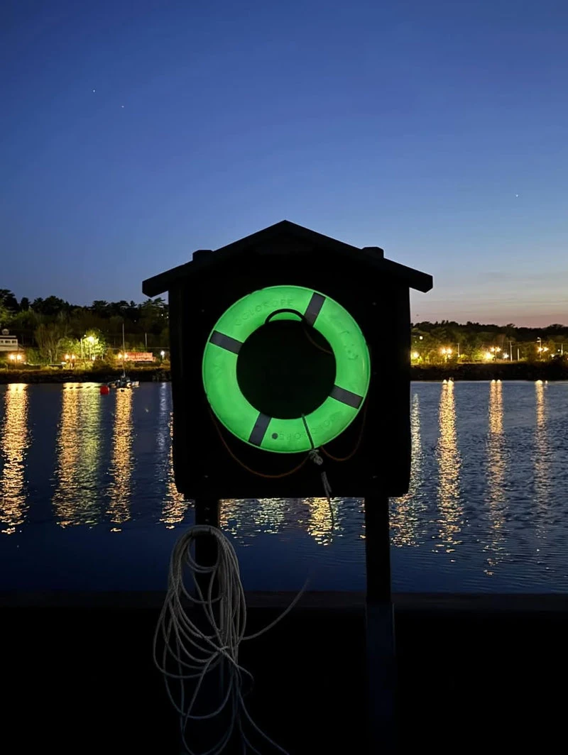 glorope life saver on lifeguard shed at dusk