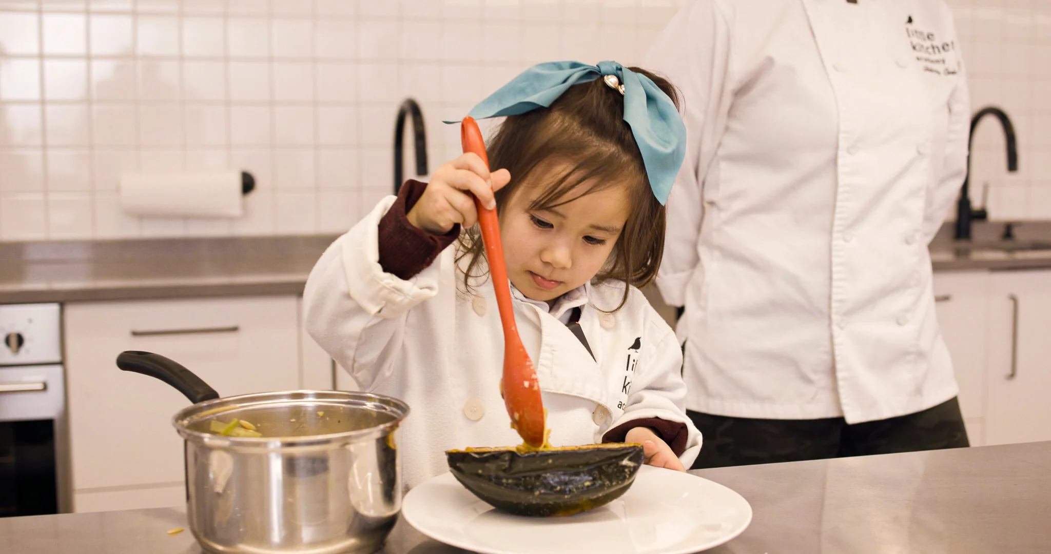 little kitchen academy child stirring
