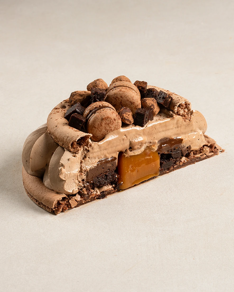 Jumbo Macaron Mousse cake slice showing layers