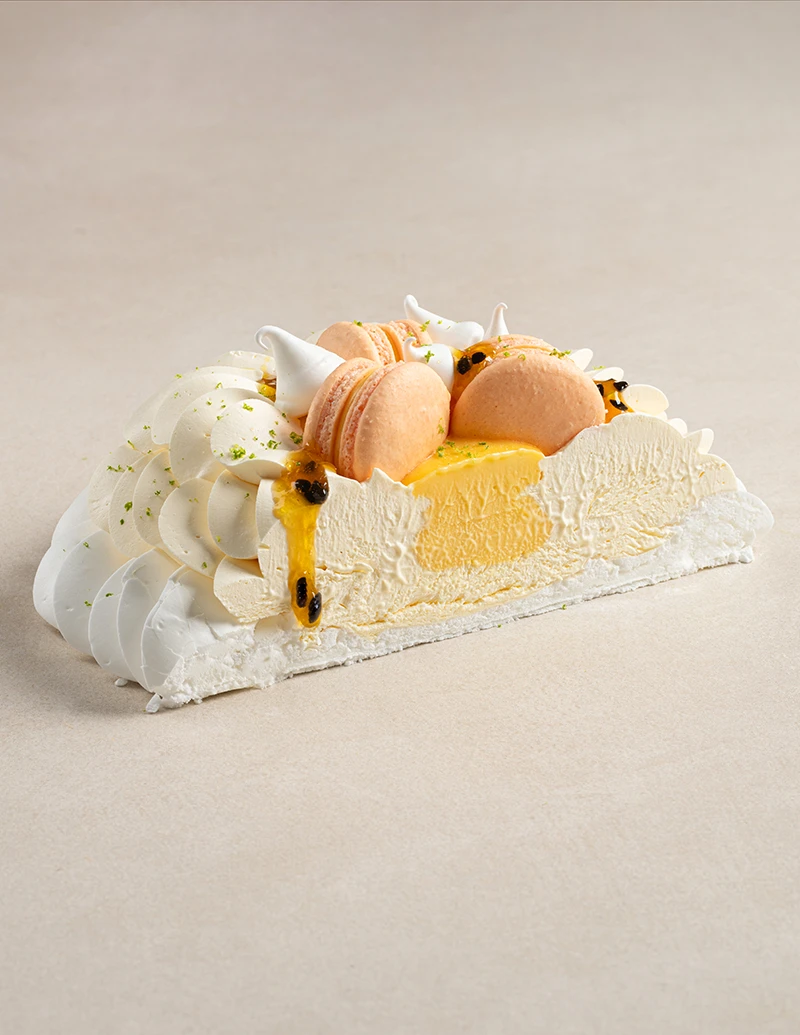 Passion Fruit Pavlova cake slice showing layers