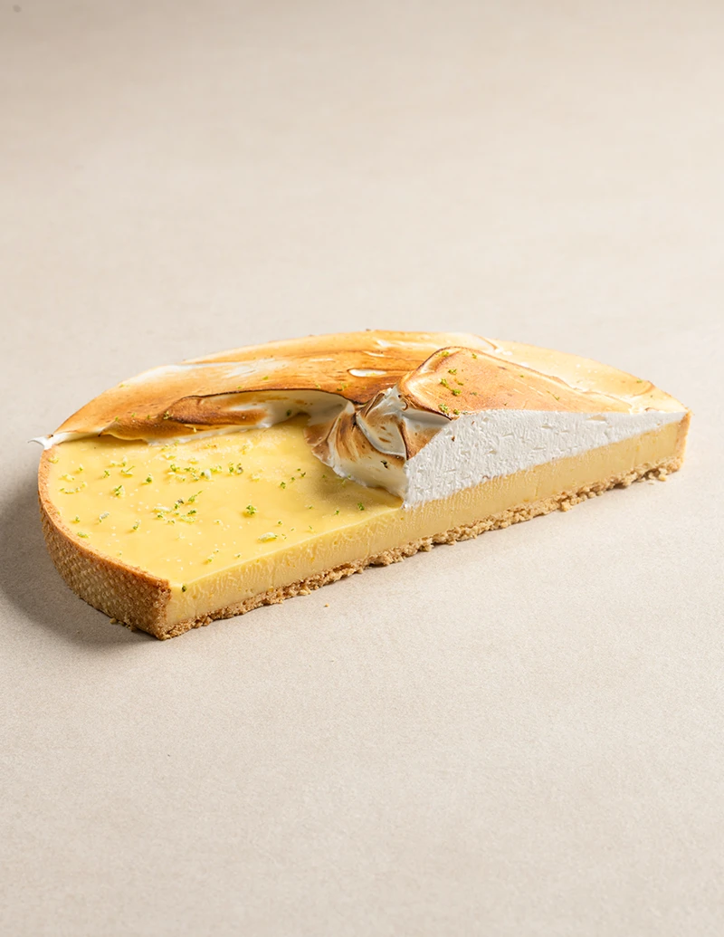 Authentic Lemon Meringue Tart cake slice showing layers
