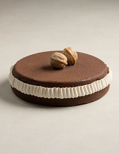 Nut Noir chocolate and nut dessert topped with praline walnuts.