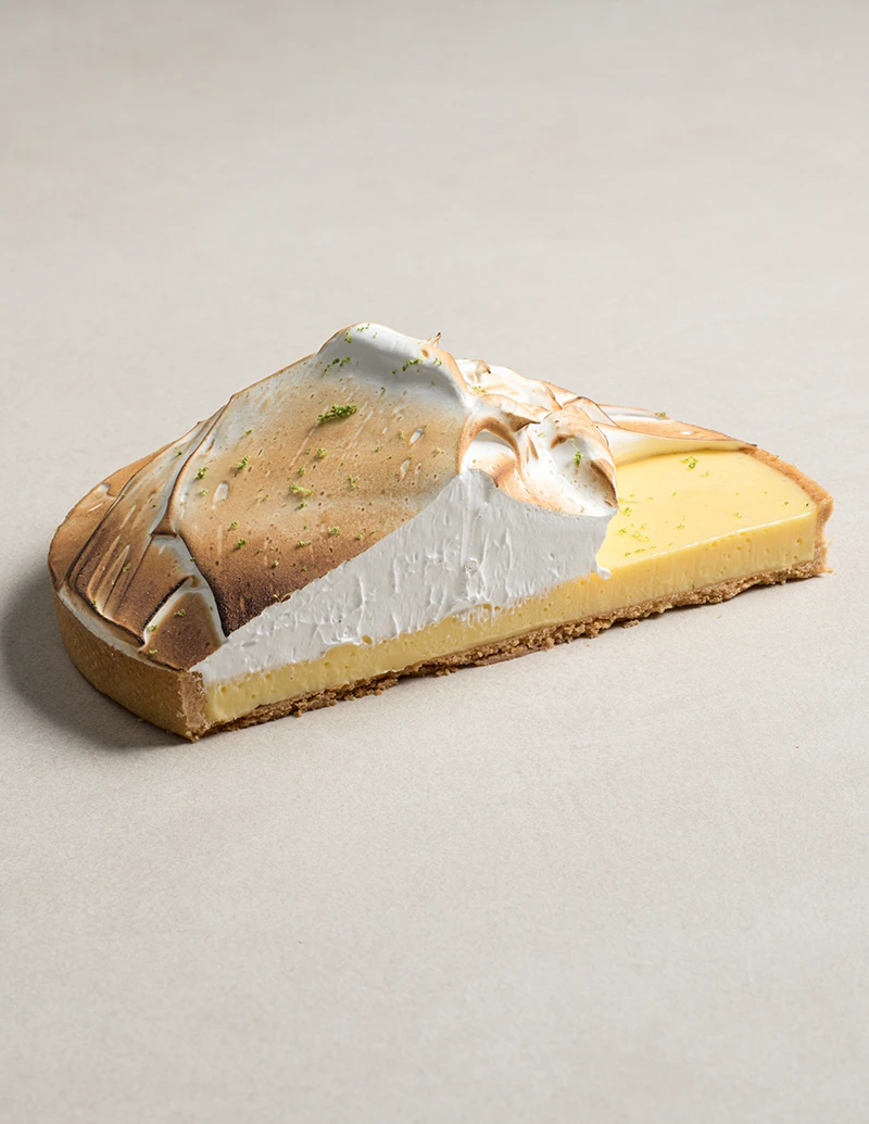 Authentic Lemon Meringue Tart cake slice showing layers