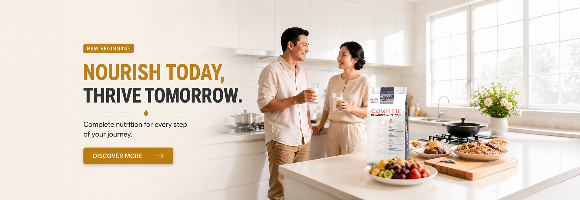 A warm lifestyle promotional poster for Metabolic+ Basic nutrition featuring a smiling couple enjoying nutritional drinks together in a bright modern kitchen. The visual emphasizes everyday nourishment and wellness with the message “Nourish Today, Thrive Tomorrow.” The product is presented as a complete and balanced nutrition formula designed to support daily wellness, muscle health, immunity, and overall vitality. Key benefits highlighted include essential vitamins and minerals, quality protein for daily strength, and balanced nutrition to support healthy living at every stage of life.