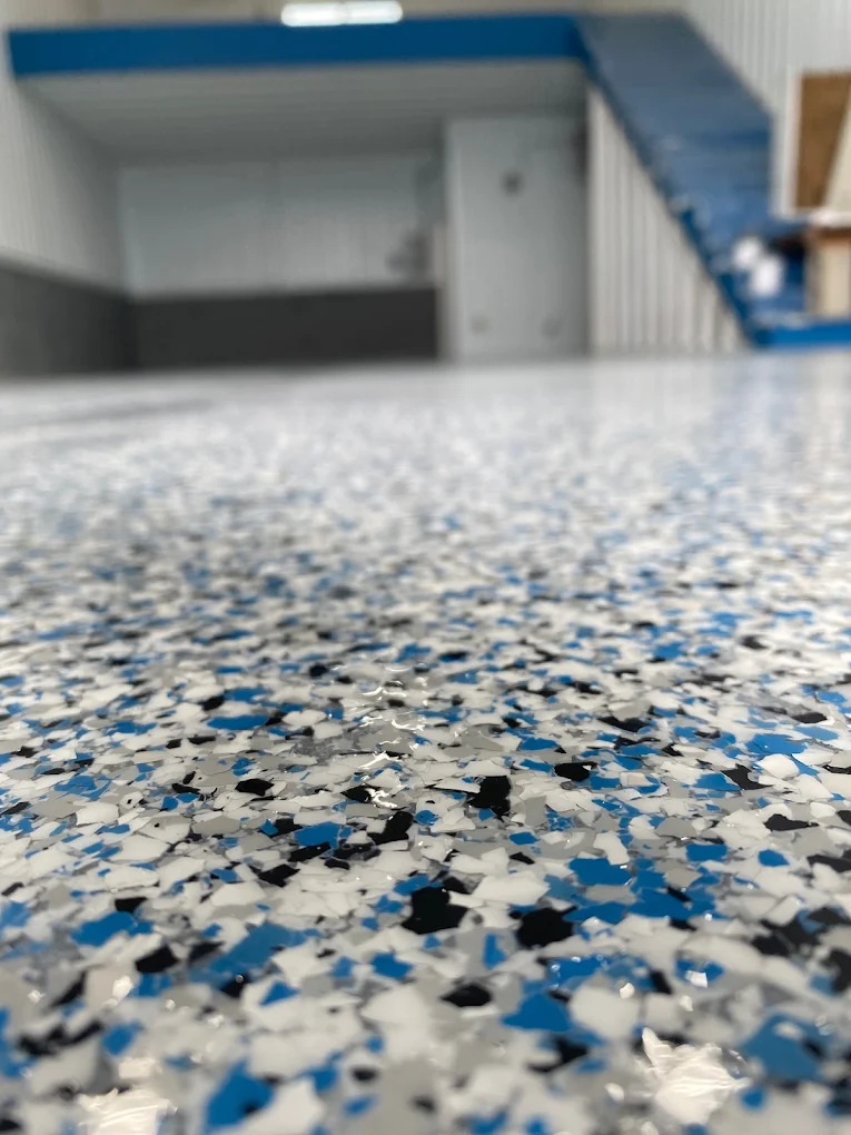 Epoxy vs Polyaspartic Garage Coatings: West Michigan Guide