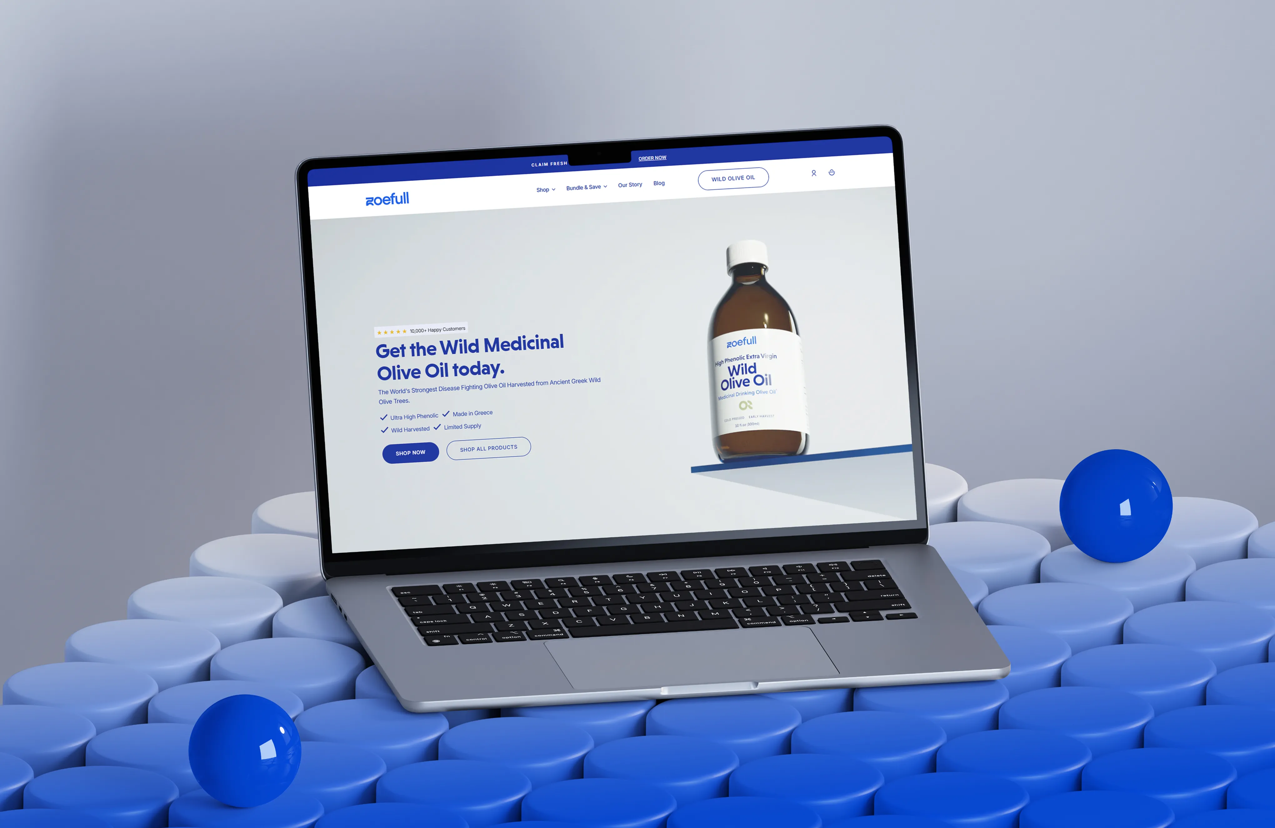 Open laptop on blue tiled table displaying Sugar Baby skincare website with product images and customer testimonials.
