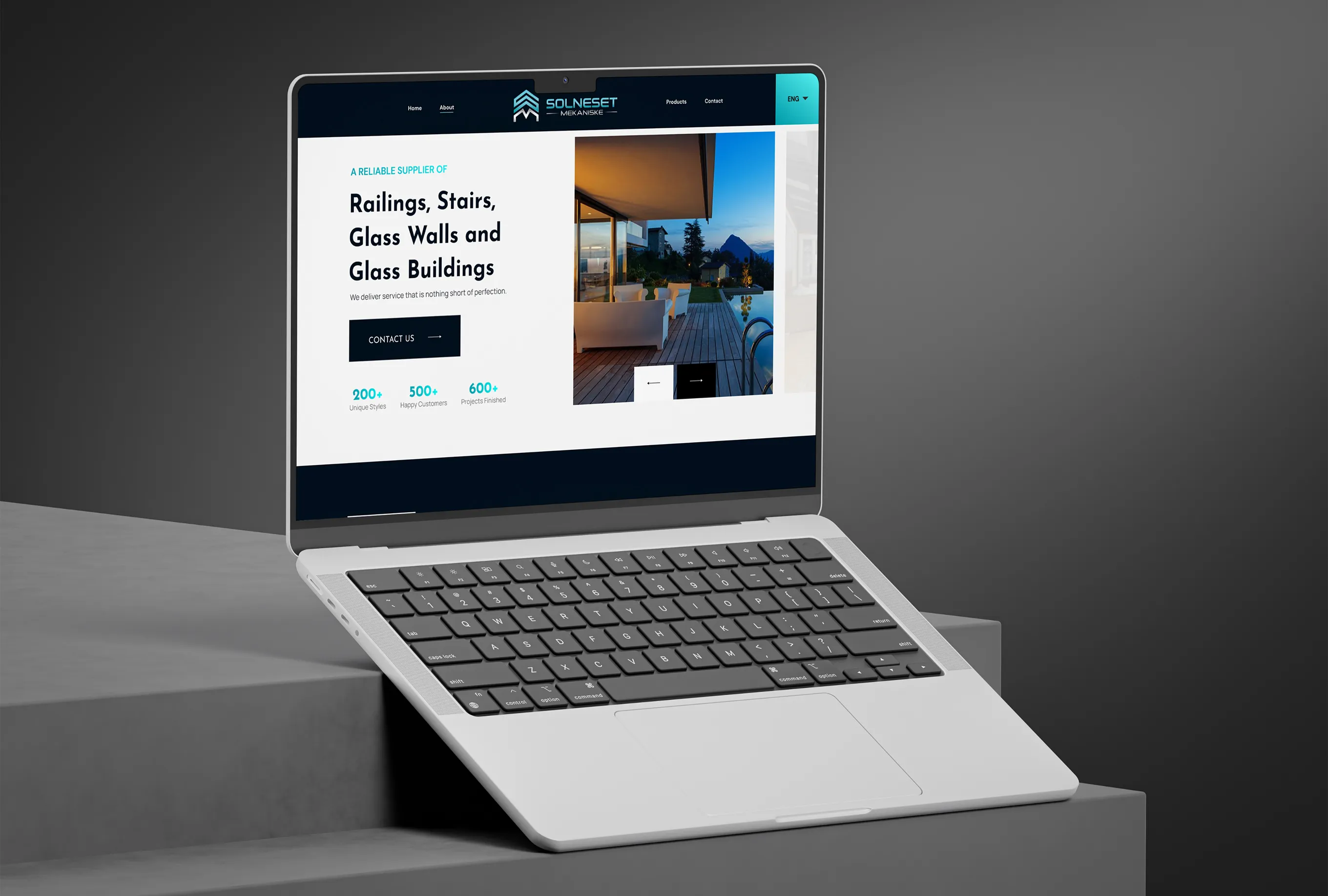 Open laptop on blue tiled table displaying Sugar Baby skincare website with product images and customer testimonials.