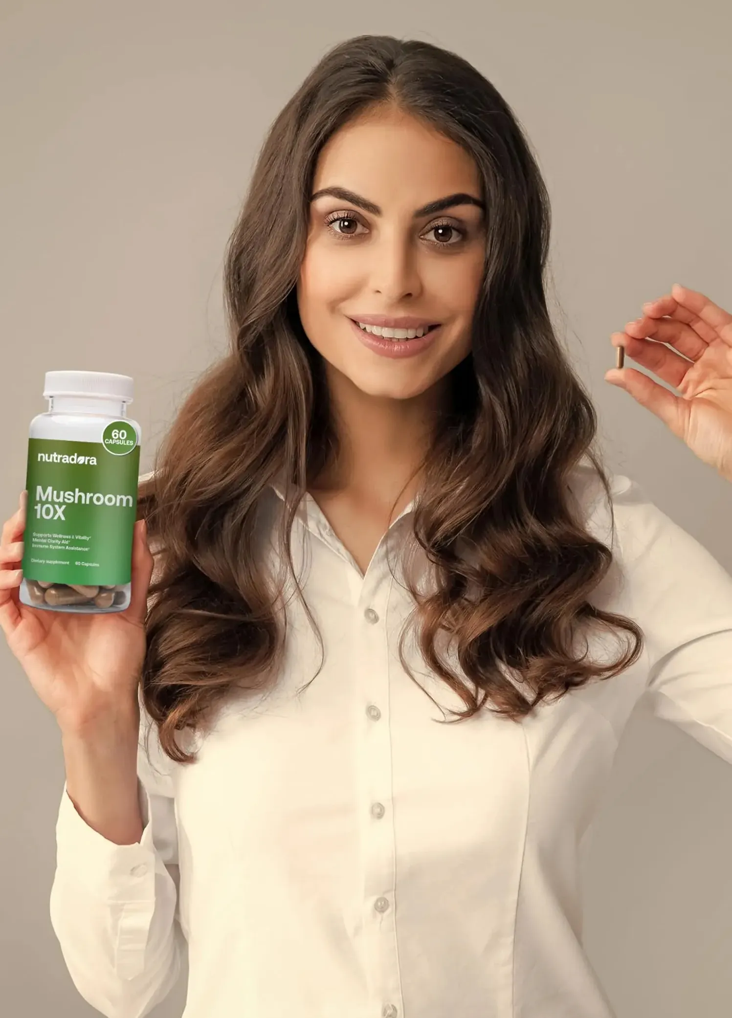 Sugar Baby skincare model using a facial cleansing brush