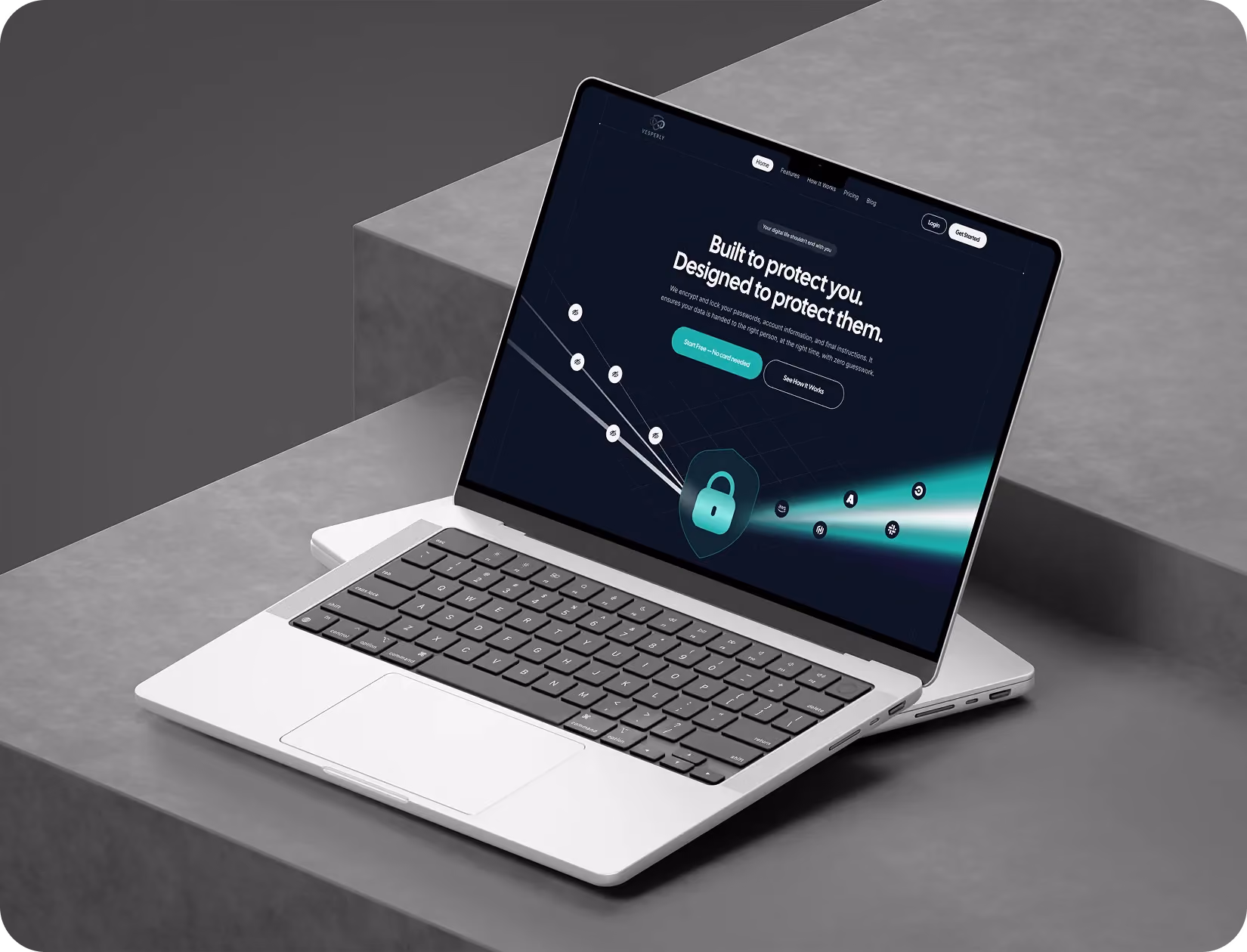 Silver laptop on gray steps showing a dark screen with a security message and a lock icon.