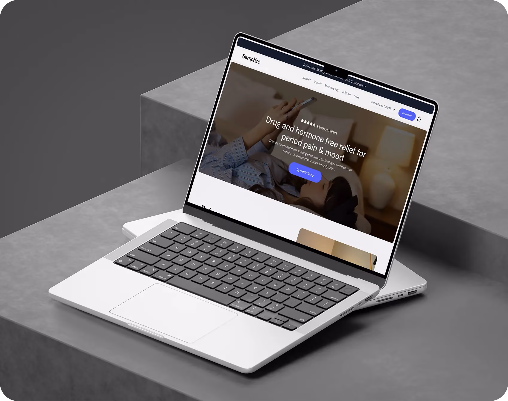 Silver laptop displaying an educational dashboard with user progress and subscription details on a beige cushioned chair.
