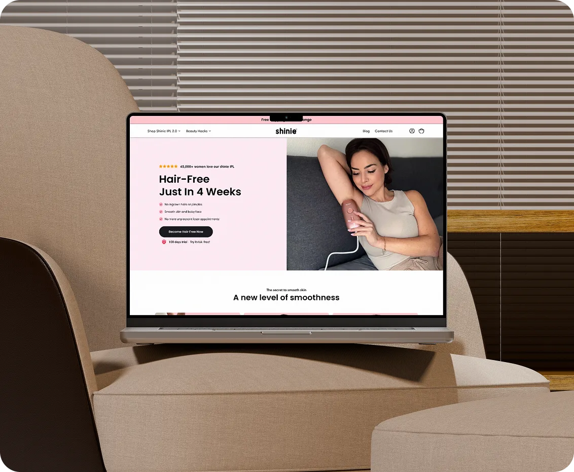 Silver laptop displaying an educational dashboard with user progress and subscription details on a beige cushioned chair.