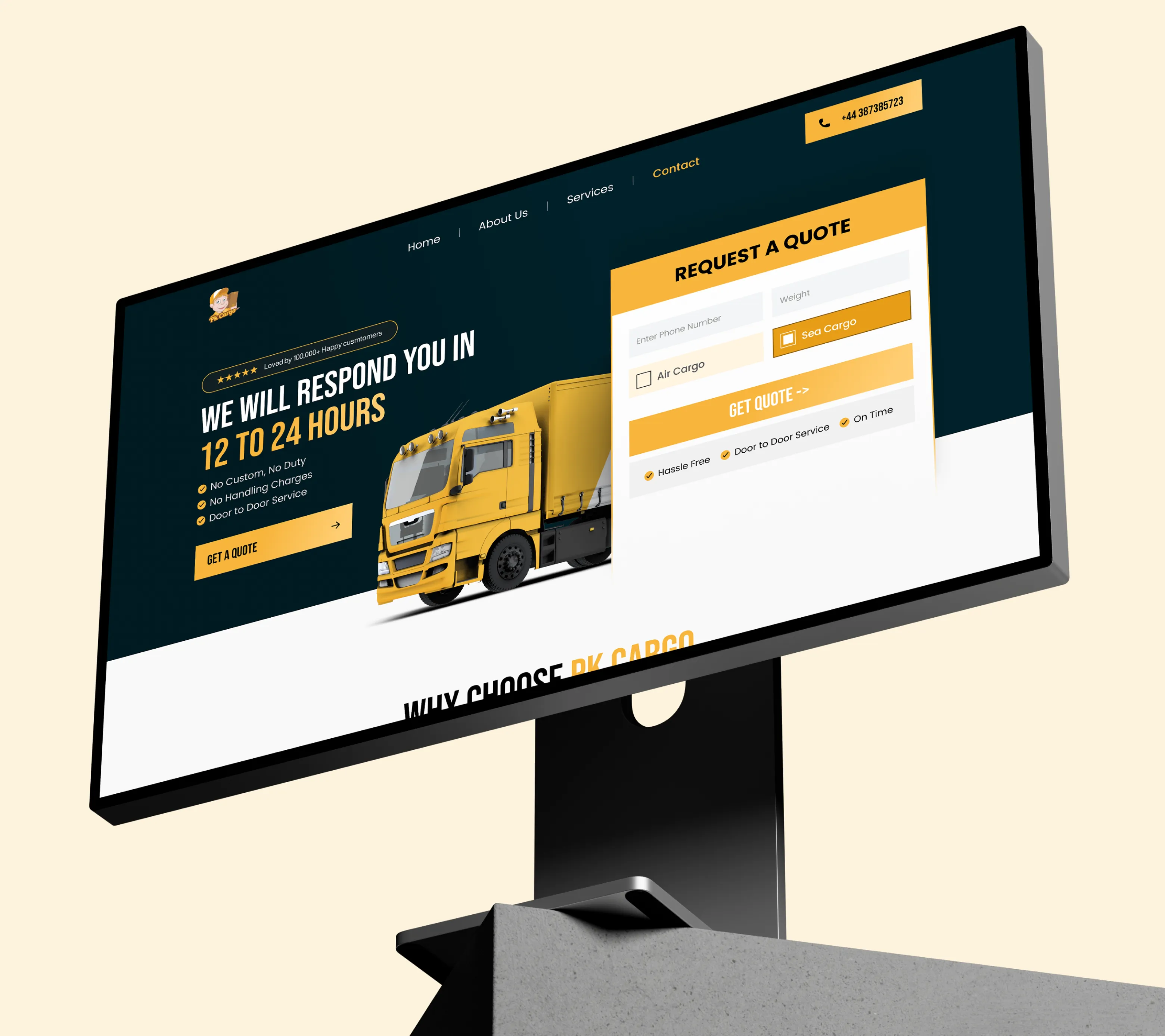 Website on a monitor showing cargo service with yellow truck and quote request form.