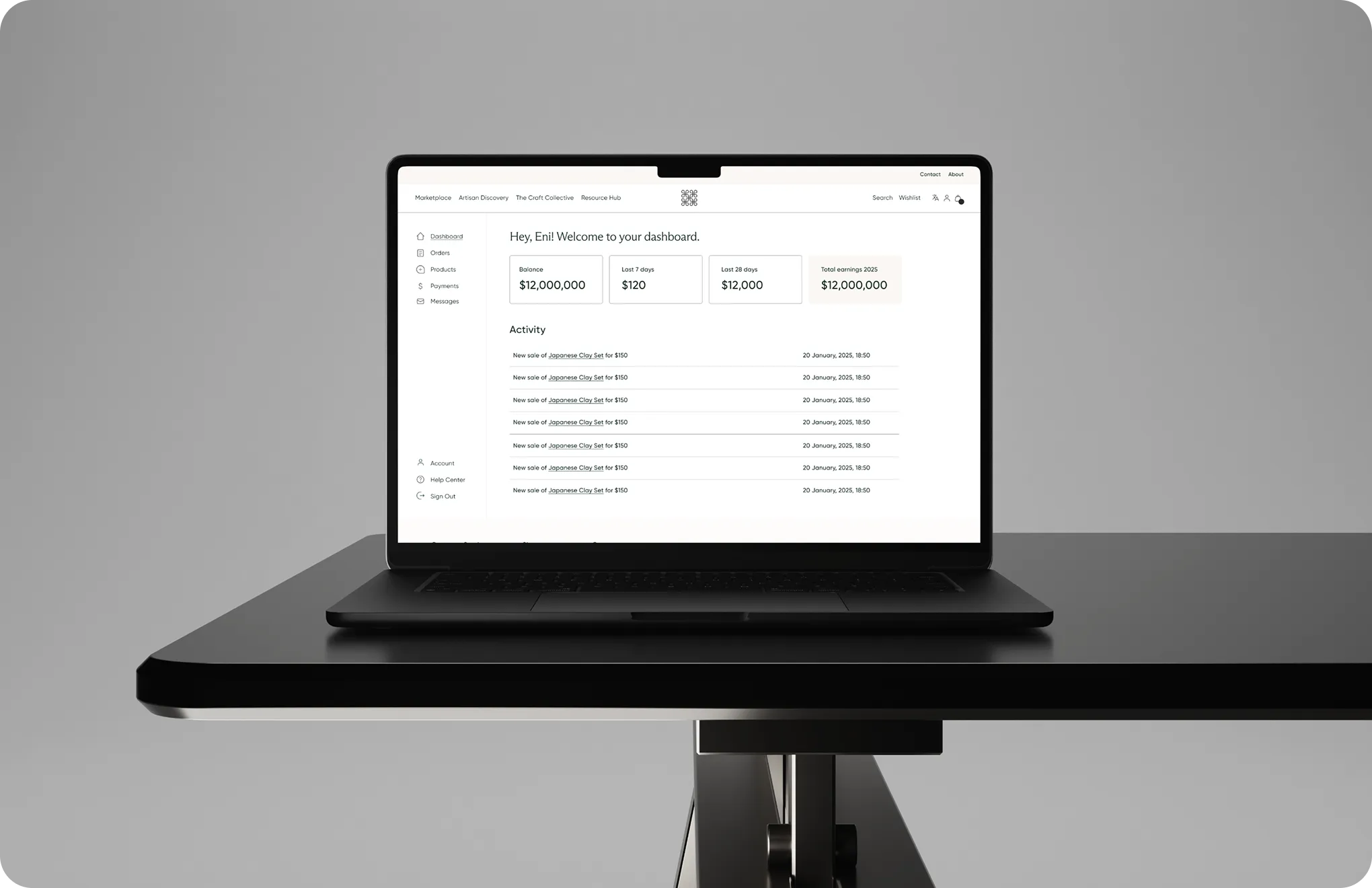 Black laptop on a black table showing a dashboard with sales, balance, and activity details.