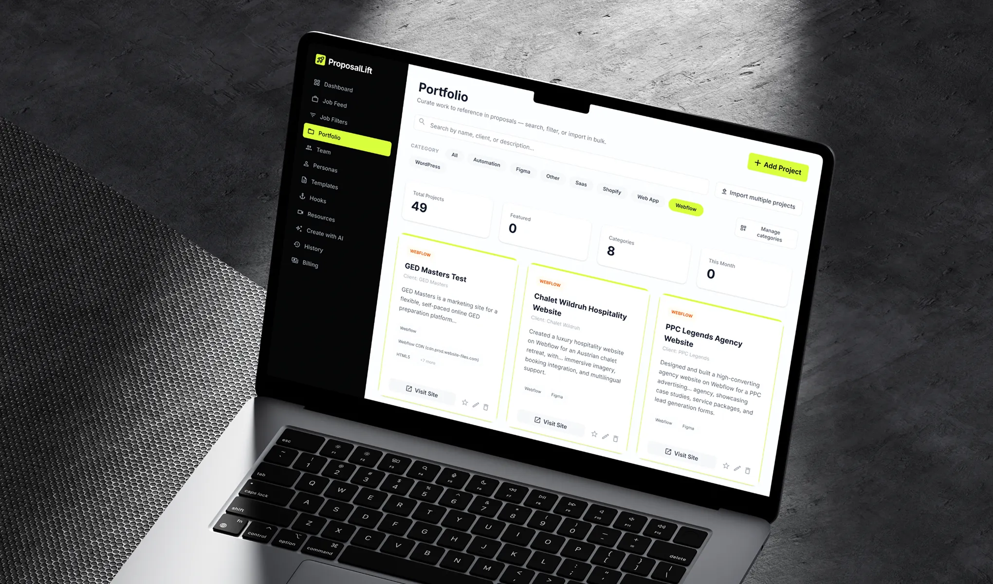 Laptop screen showing ProposalLift portfolio dashboard with project cards and categories filter.