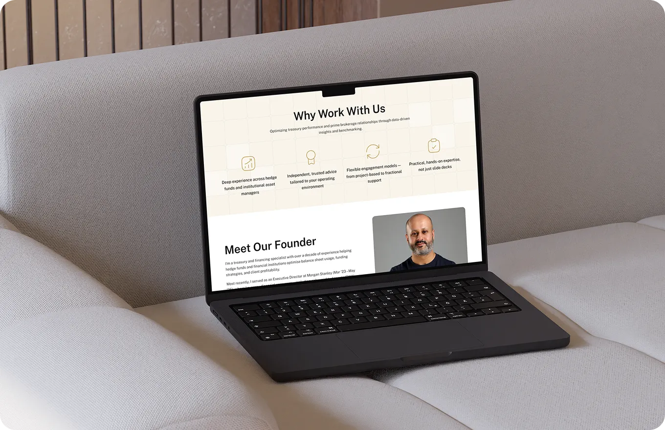 Open laptop on light sofa showing a webpage titled 'Why Work With Us' with founder's photo and text.
