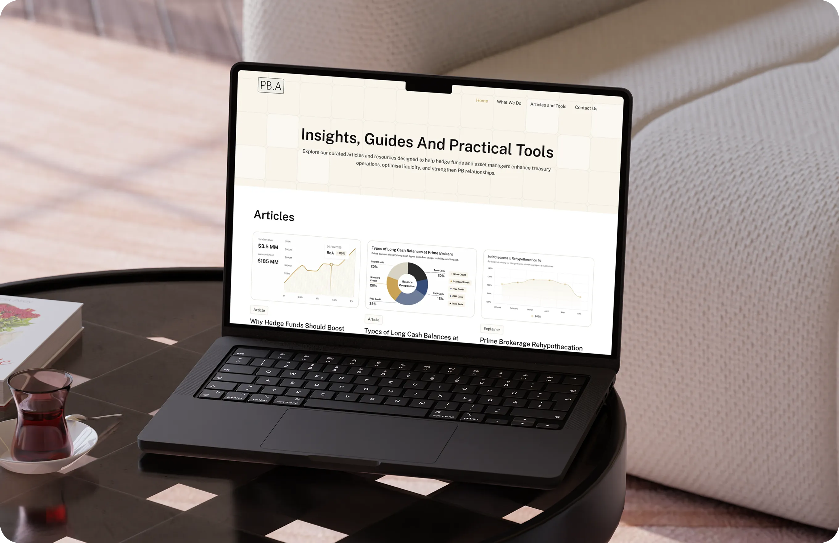 Laptop on a table showing a website with articles and charts about hedge funds and prime brokerage.