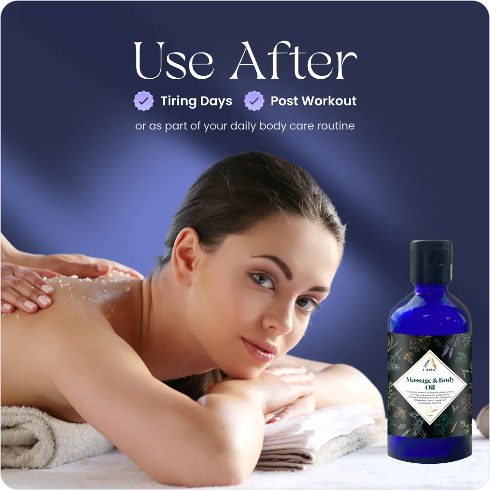 Woman receiving shoulder massage lying on towels next to a blue bottle of massage and body oil.