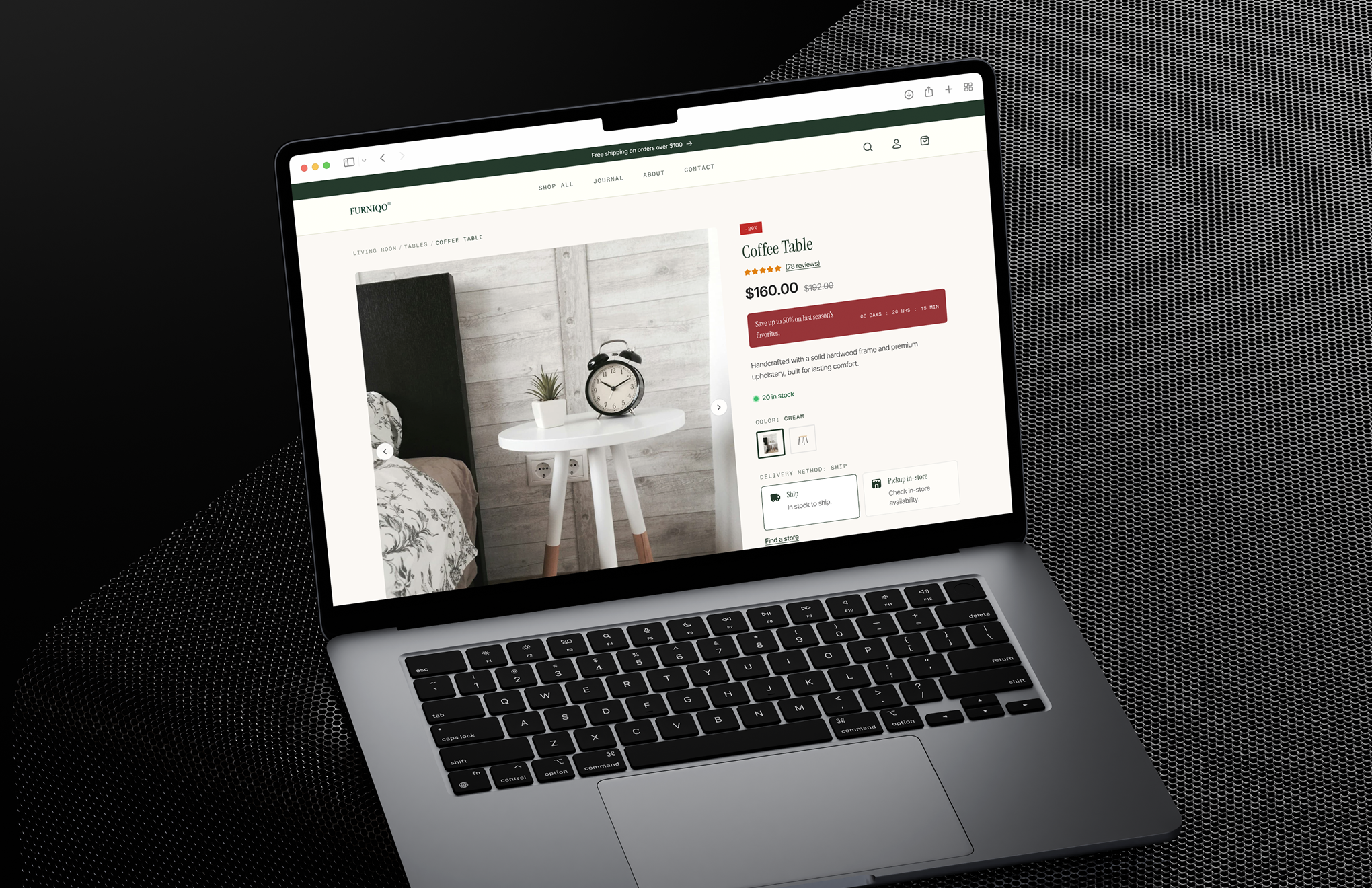 Laptop screen displaying a coffee table product page with price, reviews, and shipping options.