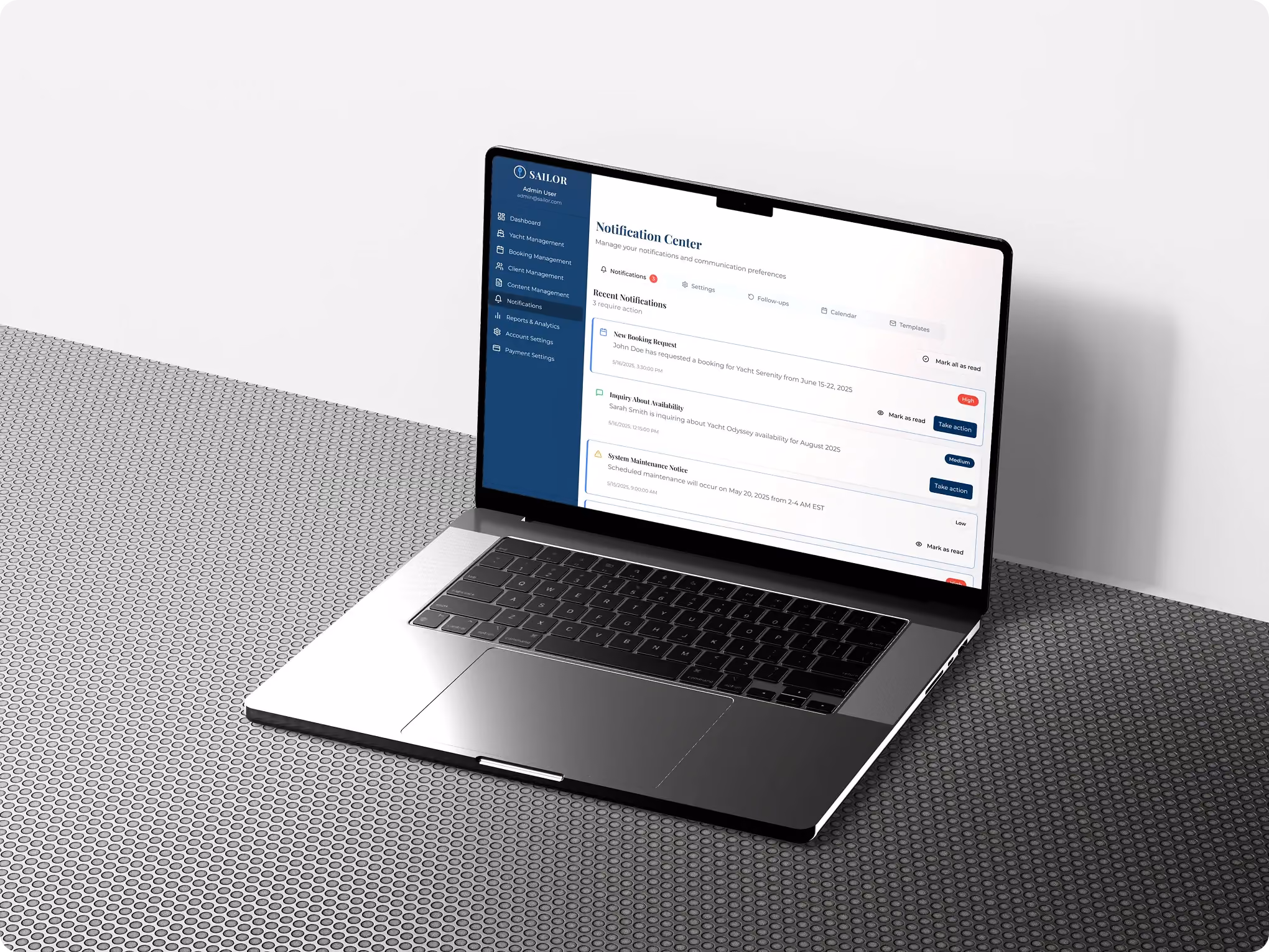 Laptop displaying the Sailor notification center with real-time booking alerts and quick action buttons