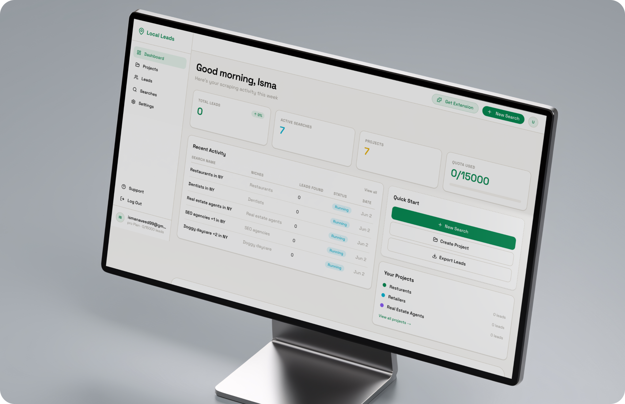 Laptop showing the LuxStay admin dashboard with total revenue, bookings today, occupancy rate, active users and a revenue trend chart