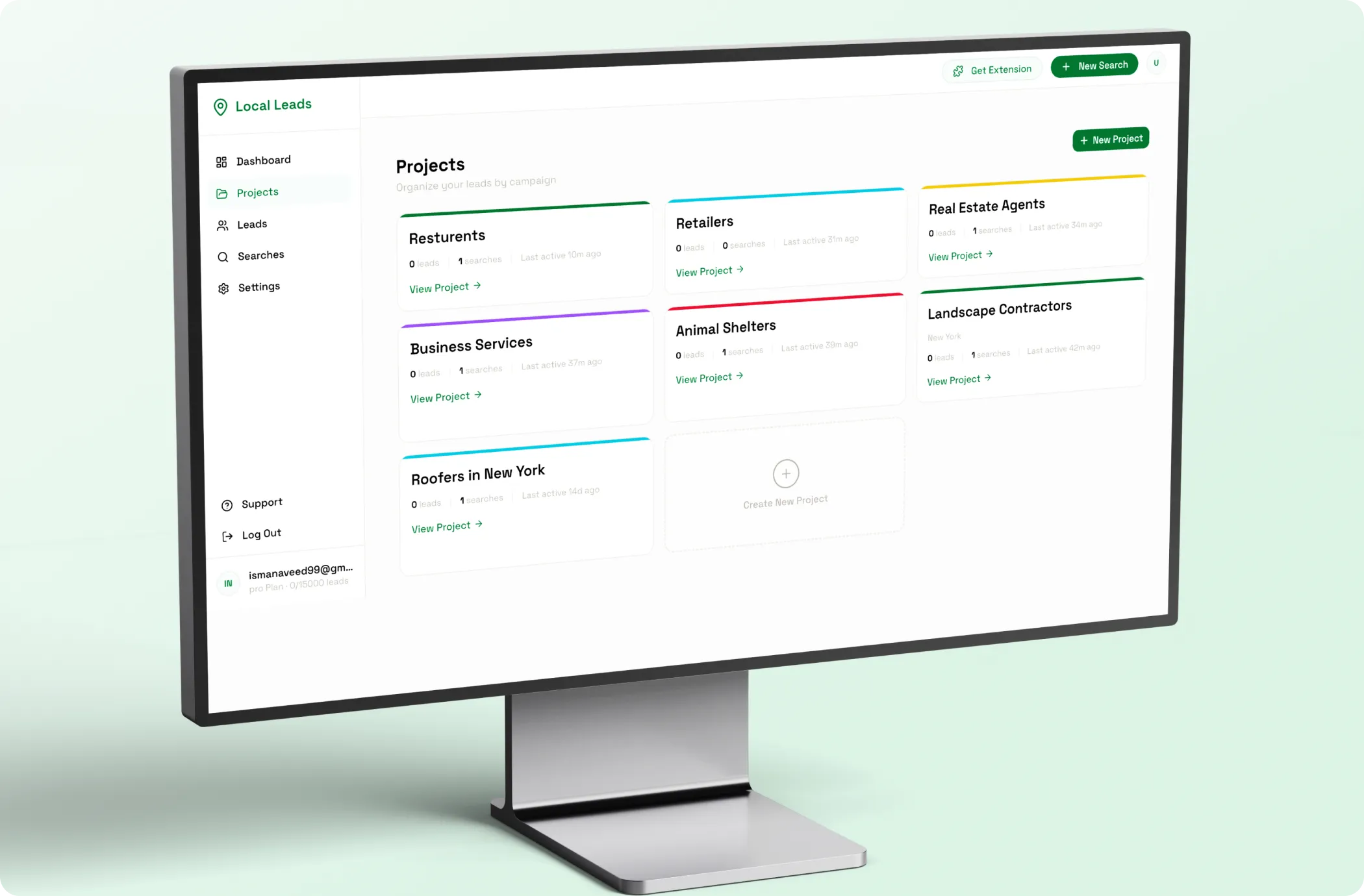 Desktop monitor showing the Local Leads projects screen with lead campaigns for restaurants, retailers, real estate agents and roofers