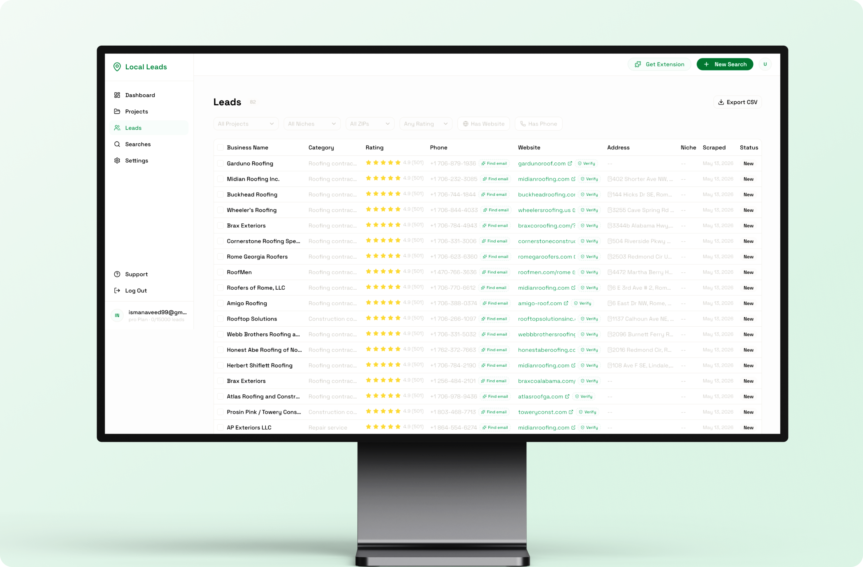 Laptop showing the LuxStay reviews management screen with average rating, pending and flagged reviews and a list of guest reviews
