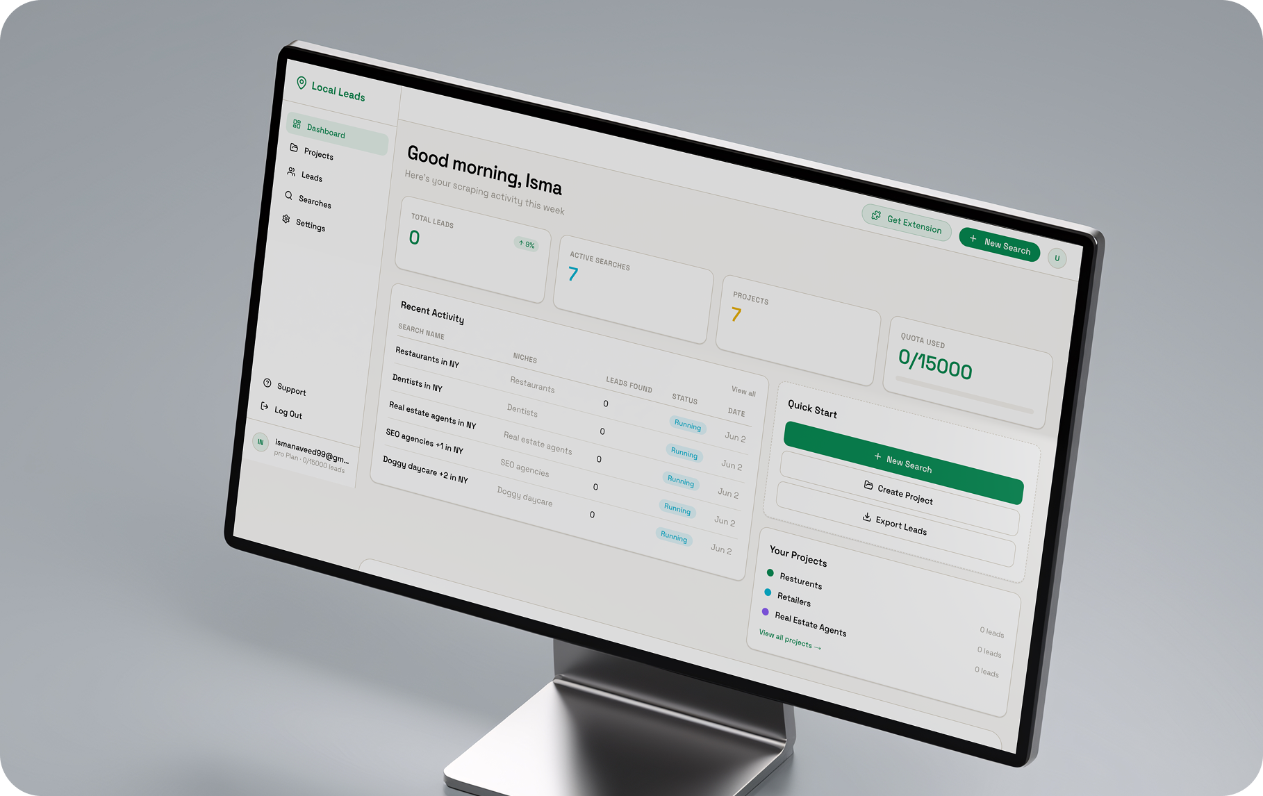 Local Leads dashboard showing recent lead searches, quick start actions, and export credits on a desktop monitor