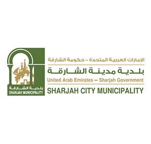 Logo of Sharjah City Municipality with Arabic and English text, featuring a green emblem with Sharjah landmarks.