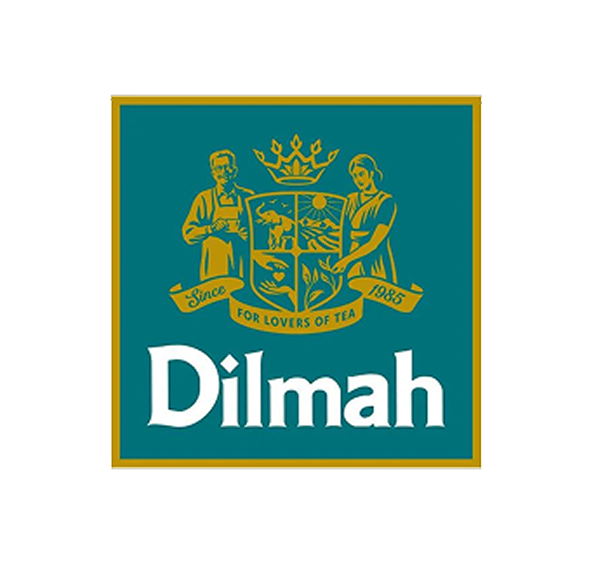 Dilmah logo featuring a man and woman holding a tea leaf crest with a crown and banner stating 'Since 1985 For Lovers of Tea'.