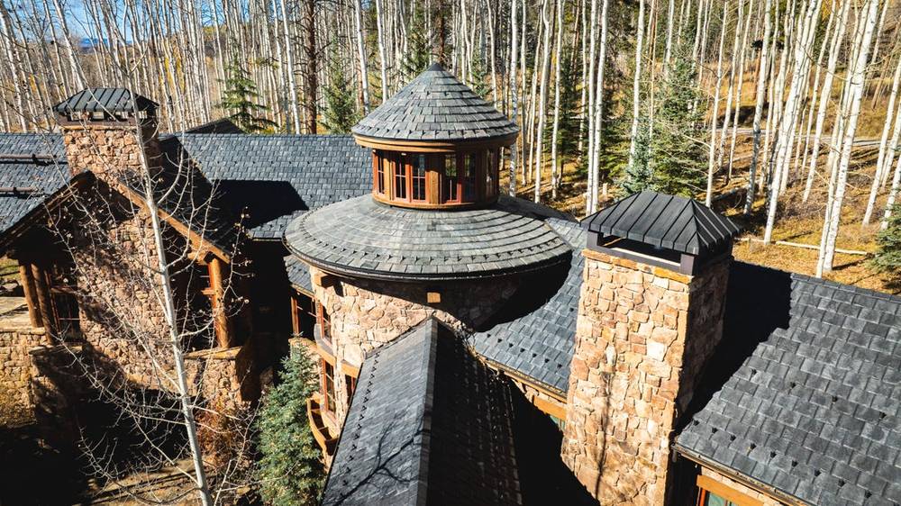 Mountain home with a Brava Arendale composite slate roof