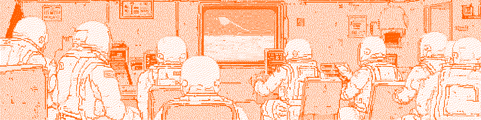 Team of engineers working in a technology lab representing blockchain research and development.