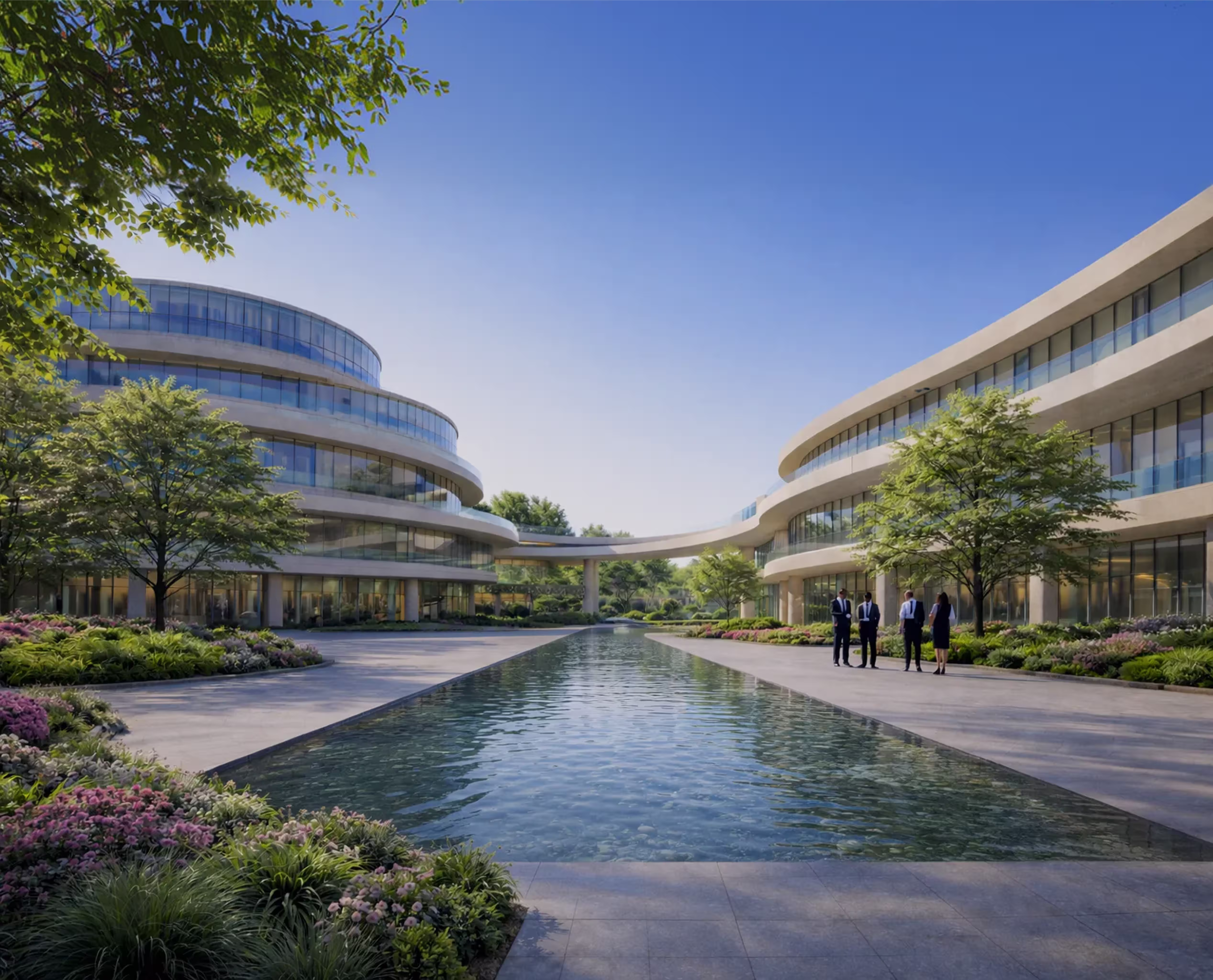 Modern office buildings with curved glass facades facing a long rectangular reflecting pool, surrounded by trees and landscaped gardens under a clear blue sky, with four people in business attire standing on the right walkway.