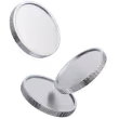 Three white contact lenses floating against a transparent background.