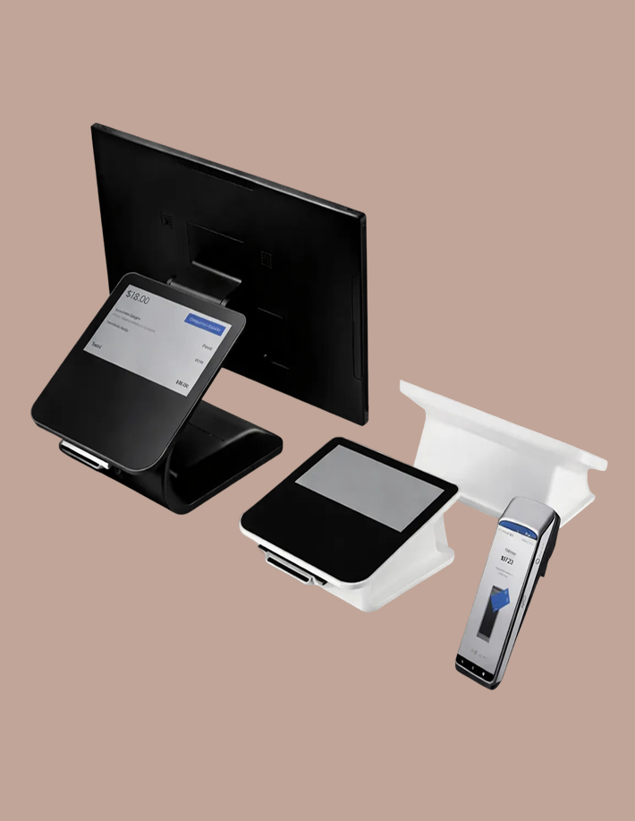 Set of modern point-of-sale devices including a black dual-screen terminal, a white card reader, and a handheld payment device.