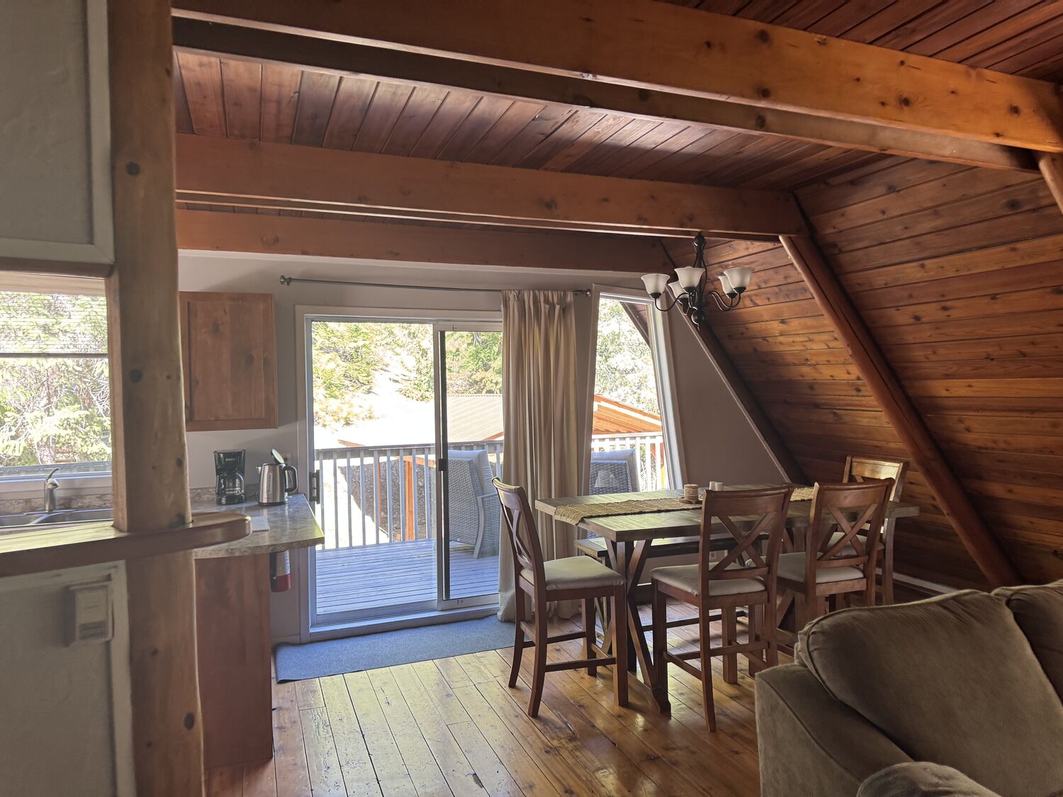 The dining area and deck doors in Eagle Chalet