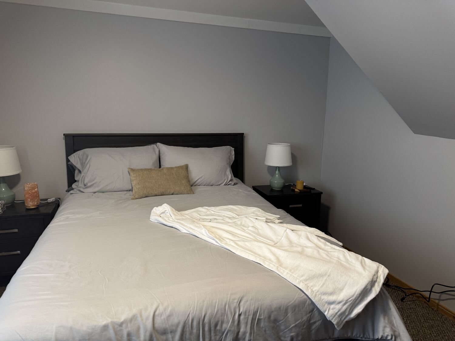 The queen bed in the Queen Room walk out at The Healing Oasis