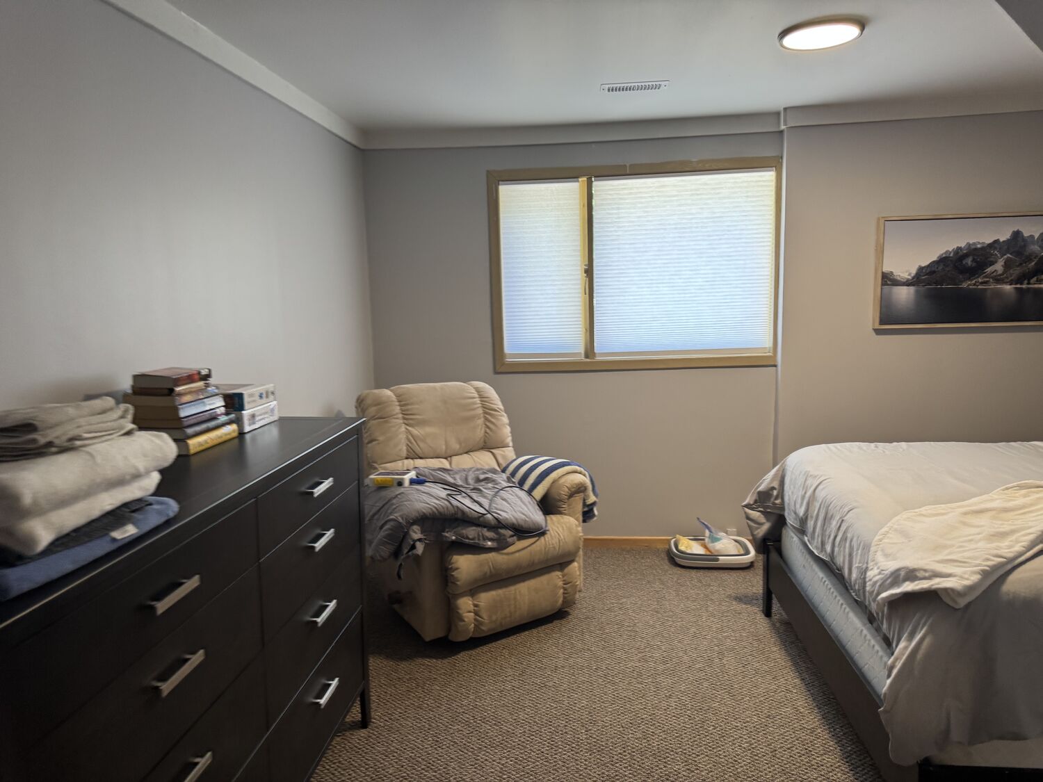 The dresser and recliner in the Queen Room walk out