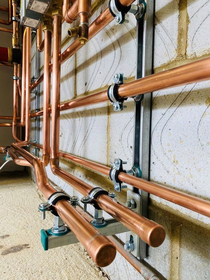 Smooth dark gray satin fabric with soft folds and gentle highlights.