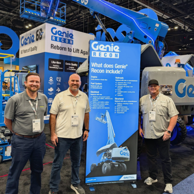 blog thumbnail image of stack equipment team at the ara show standing in the Genie booth