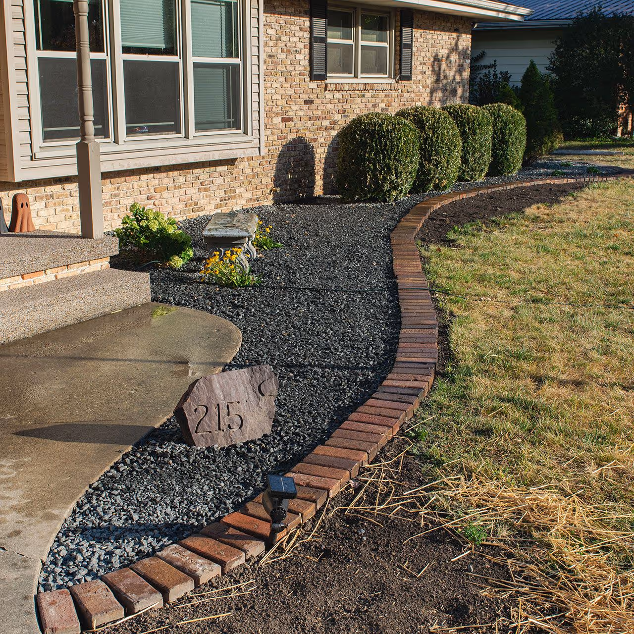 Clean, structured landscape design for a residential property in Arthur, IL