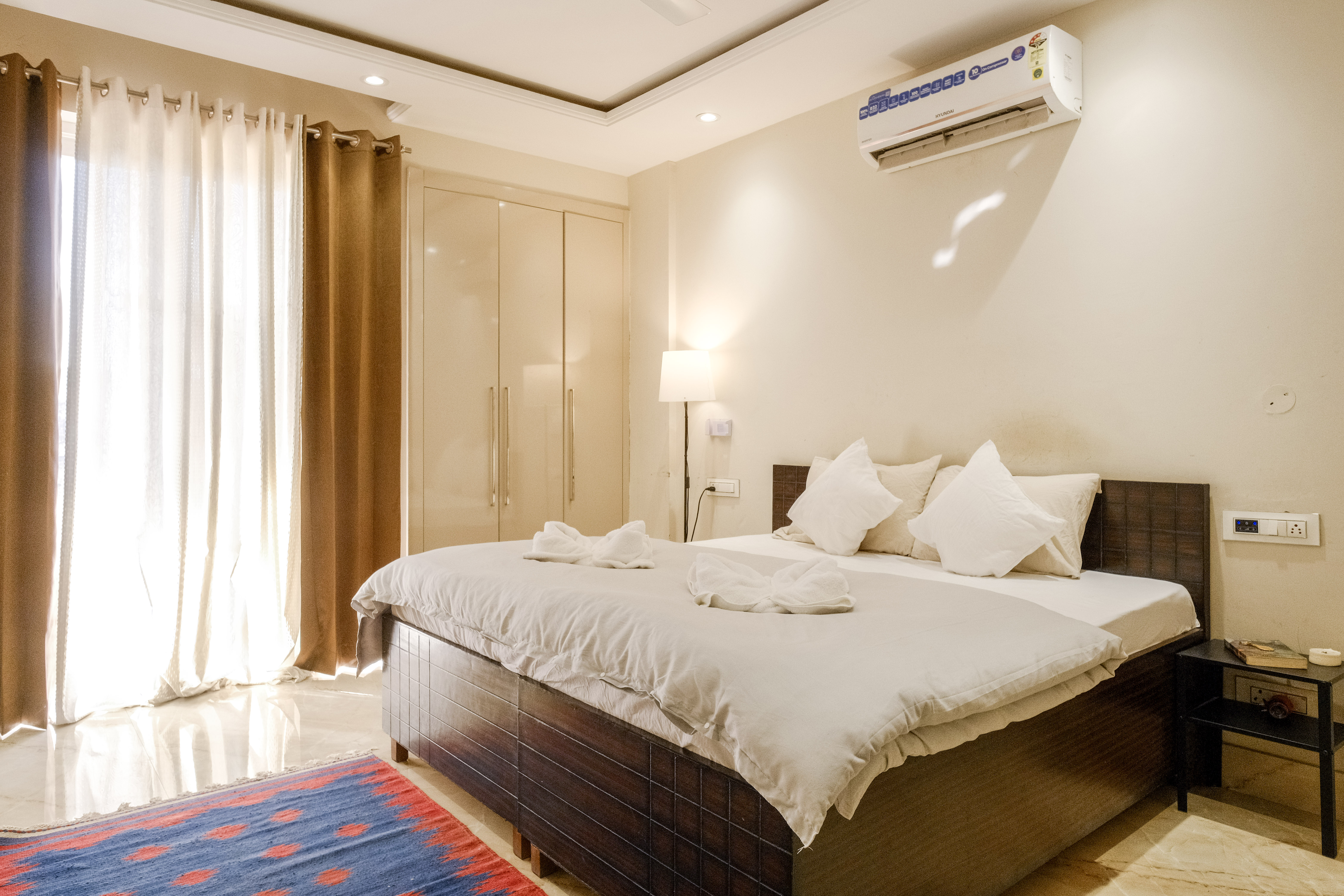 image of a tranquil bedroom bathed in sunlight