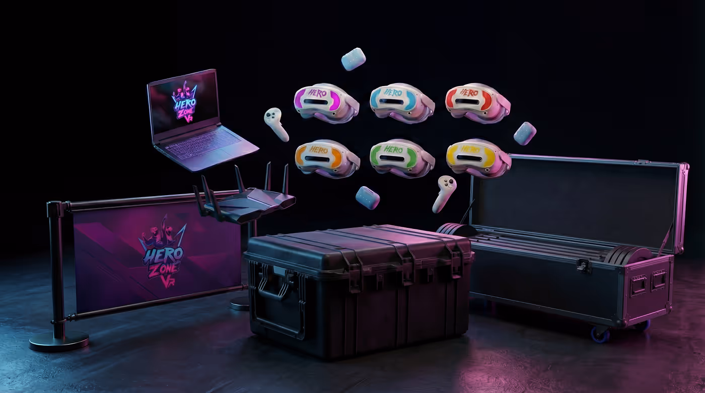 Set of VR headsets labeled 'HERO' in different colors floating above a black hard case, a laptop, white controllers, a router, and a black equipment case with 'HERO ZONE VR' branded banner and screen.