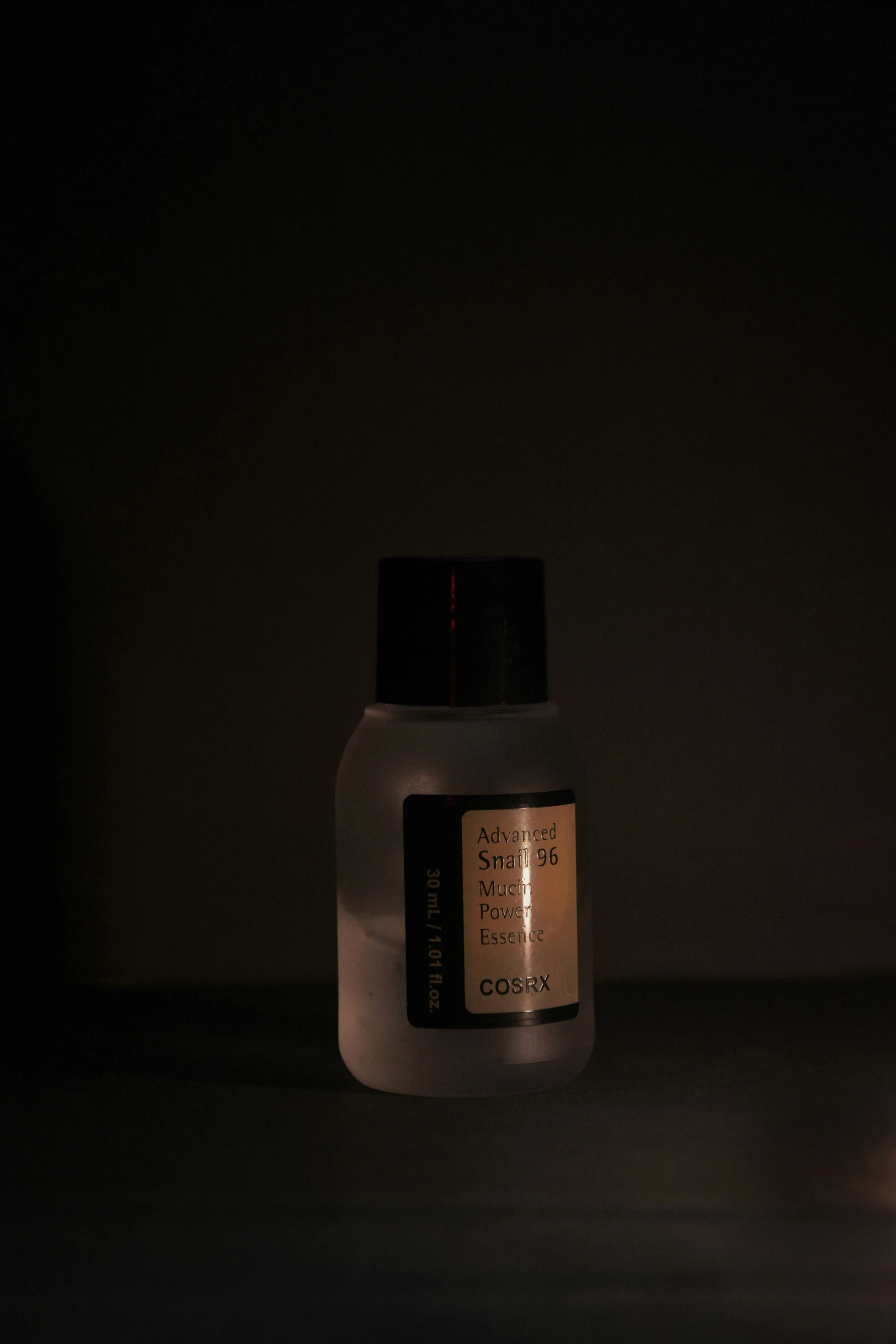 A silver sculpture featuring engraved words, reflecting artistic expression and thoughtful design.